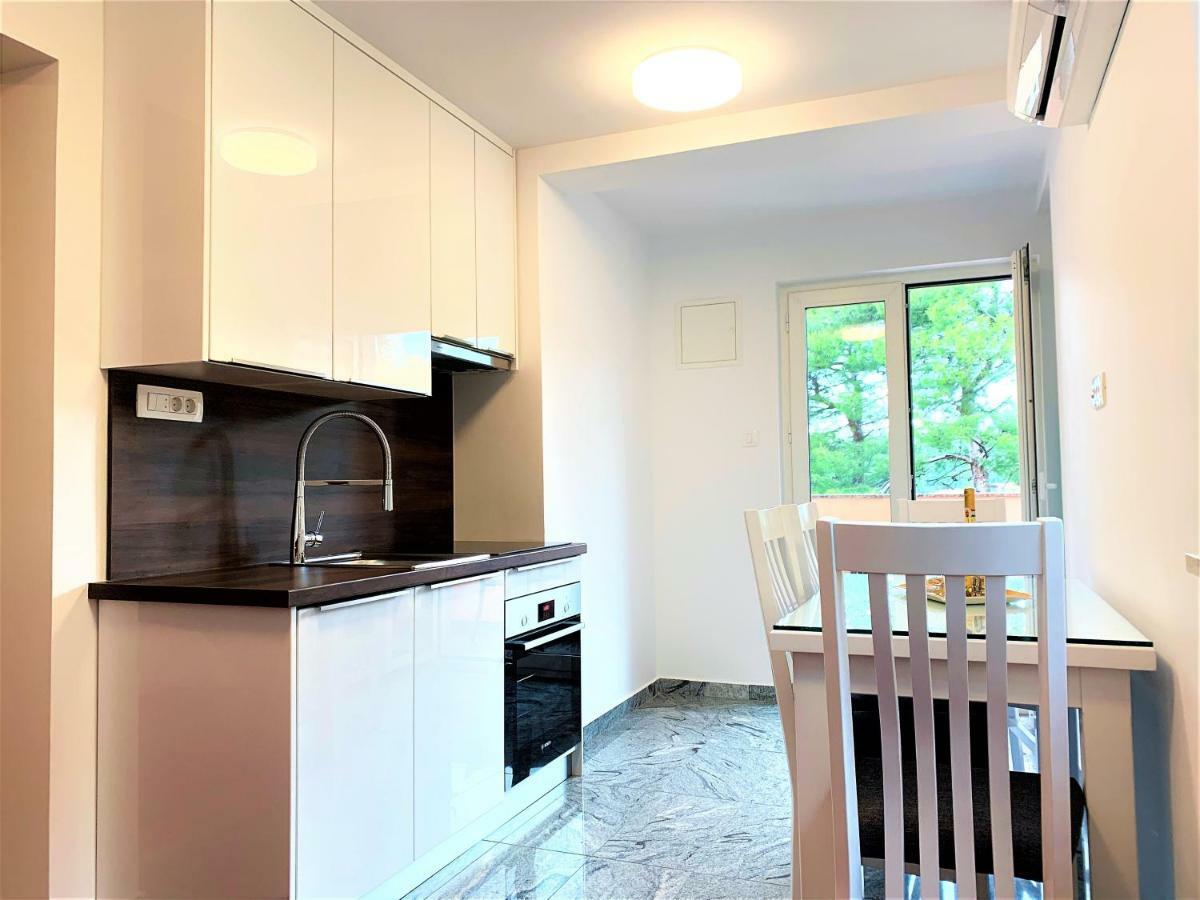 Apartment And Rooms Milak ราบ ภายนอก รูปภาพ